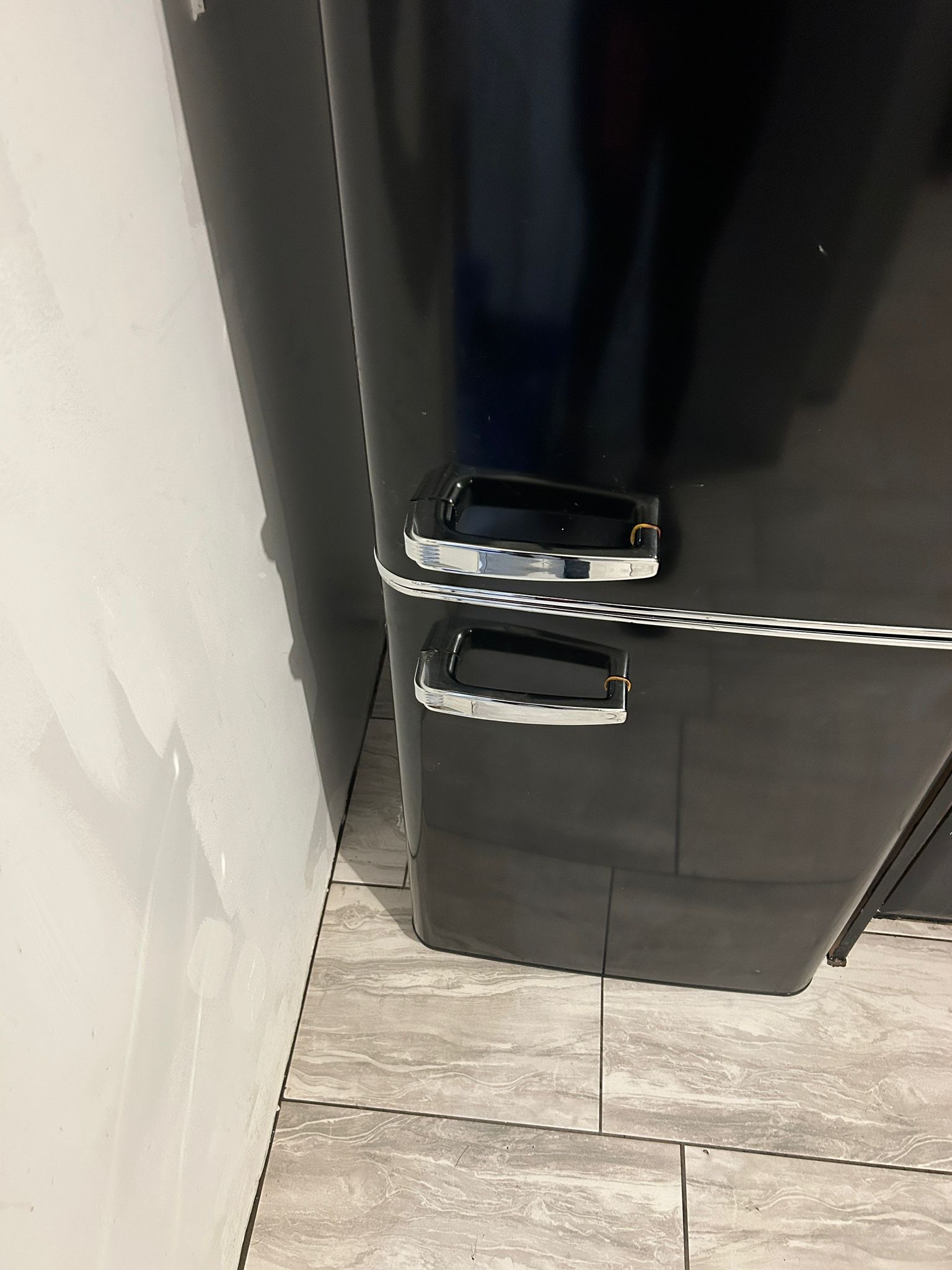 Polished stainless steel fridge door