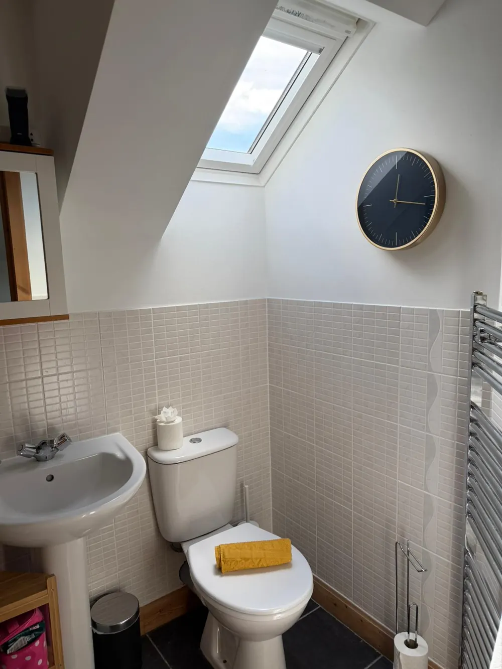 Spotless loft bathroom with skylight after professional cleaning in Fife